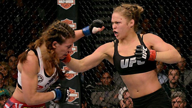 122813-UFC-ronda-rousey-punches-miesha-tate-ahn-PI.vadapt.955.high.0